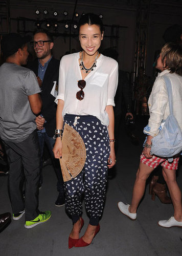 Styler Lily Kwong nailed the slouchy trouser look with a bold blue printed iteration, accenting the style with a white blouse and a red pump.
Styler Lily Kwong nailed the slouchy trouser look with a bold blue printed iteration, accenting the style with a white blouse and a red pump.