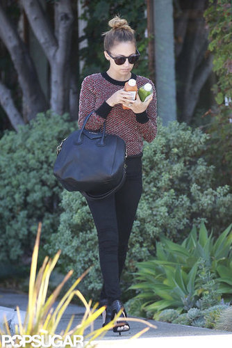 Nicole Richie took to the sidewalk in LA wearing shades and a high bun.
Nicole Richie took to the sidewalk in LA wearing shades and a high bun.
