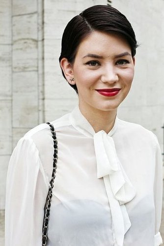 An Audrey Hepburn-inspired pixie is as timeless as it is beautiful, especially when paired with red lipstick.
Photo by Caroline Voagen Nelson
An Audrey Hepburn-inspired pixie is as timeless as it is beautiful, especially when paired with red lipstick.
Photo by Caroline Voagen Nelson