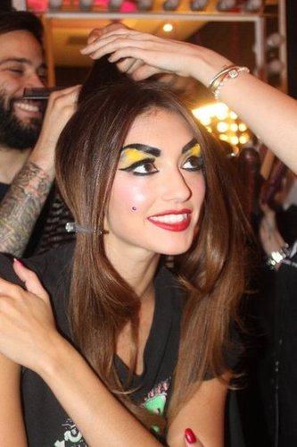 The team used Control Force Hair Spray ($26) to set the hair in a strong zigzag pattern during the crimping process. And before models walked out on the runway, stylists used their fingers to tousle and break up the wave.
The team used Control Force Hair Spray ($26) to set the hair in a strong zigzag pattern during the crimping process. And before models walked out on the runway, stylists used their fingers to tousle and break up the wave.