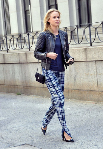 Plaid pants are given the prep-school-meets-punk treatment with a chain-strap bag and a quilted leather jacket.
Plaid pants are given the prep-school-meets-punk treatment with a chain-strap bag and a quilted leather jacket.