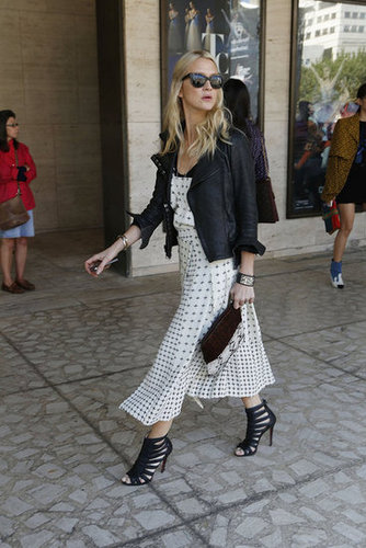 A leather jacket gave a printed midi dress a cool counterpart — as did a pair of cage booties.
A leather jacket gave a printed midi dress a cool counterpart — as did a pair of cage booties.