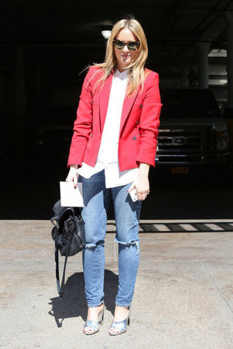 Menswear staples had trendier flair via ripped denim and metallic Phillip Lim heels.
Menswear staples had trendier flair via ripped denim and metallic Phillip Lim heels.