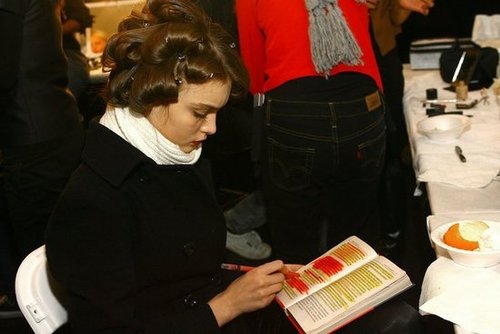 A model highlighted her book backstage at the J Mendel Fall 2007 fashion show during Mercedes-Benz Fashion Week.
A model highlighted her book backstage at the J Mendel Fall 2007 fashion show during Mercedes-Benz Fashion Week.