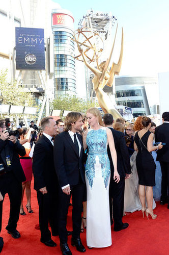 Nicole Kidman left Sunday and Faith home to wow the crowd in Antonio Berardi's white gown with blue sparkly detailing.
Nicole Kidman left Sunday and Faith home to wow the crowd in Antonio Berardi's white gown with blue sparkly detailing.