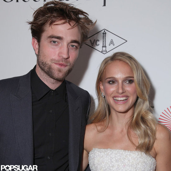 Natalie Portman wore a white dress while Robert Pattinson opted for a dark suit.
Natalie Portman wore a white dress while Robert Pattinson opted for a dark suit.