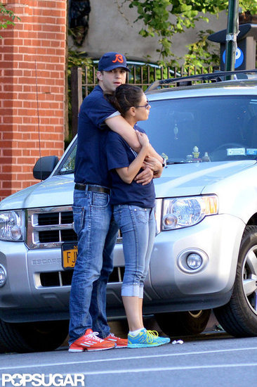Mila Kunis and Ashton Kutcher Share a Hug in Matching Outfits Mila Kunis and Ashton Kutcher Share a Hug in Matching Outfits