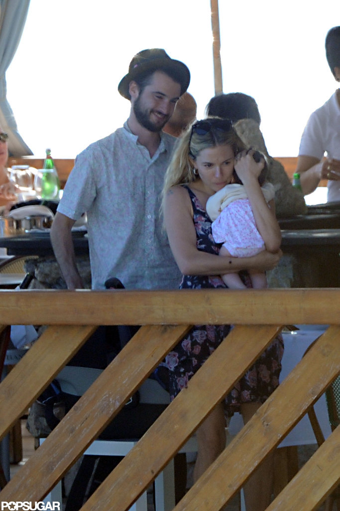 Tom Sturridge smiled as he watched Sienna Miller cuddle baby Marlowe.
Tom Sturridge smiled as he watched Sienna Miller cuddle baby Marlowe.