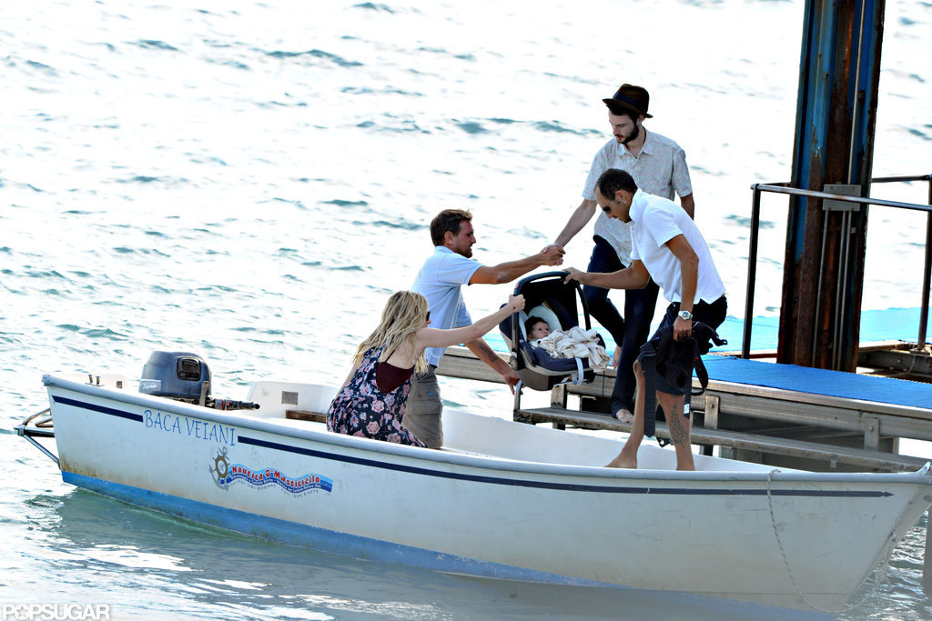 Baby Marlowe was handed to mom Sienna Miller as dad Tom Sturridge boarded a boat behind them.
Baby Marlowe was handed to mom Sienna Miller as dad Tom Sturridge boarded a boat behind them.