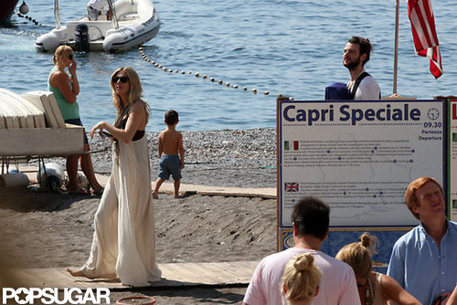 Sienna Miller walked along the beach in Positano.
Sienna Miller walked along the beach in Positano.