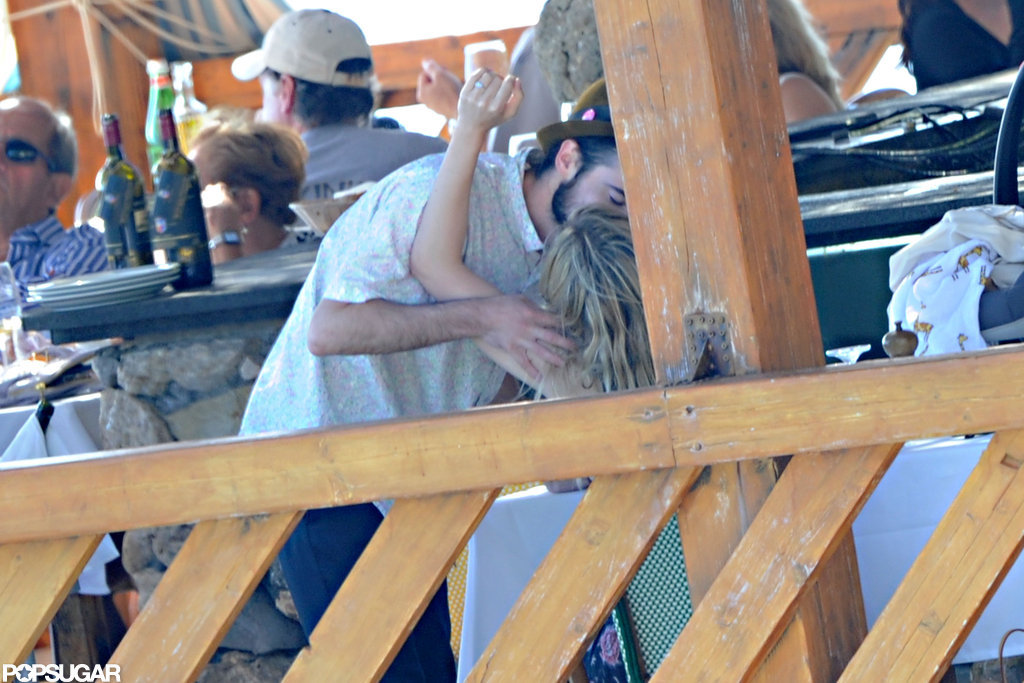 Tom Sturridge and Sienna Miller kissed on a boat in Positano.
Tom Sturridge and Sienna Miller kissed on a boat in Positano.