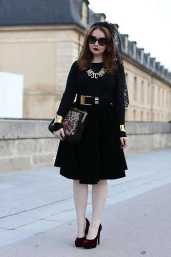 Statement add-ons give her ladylike dress a lot more character.
Statement add-ons give her ladylike dress a lot more character.