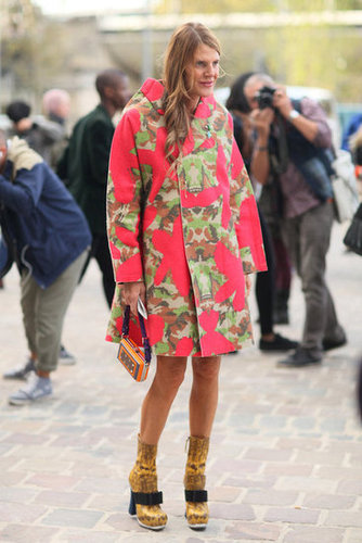 Anna Dello Russo knows how to make an entrance, this time in a camo-printed bright coat and quirky footwear.
Anna Dello Russo knows how to make an entrance, this time in a camo-printed bright coat and quirky footwear.