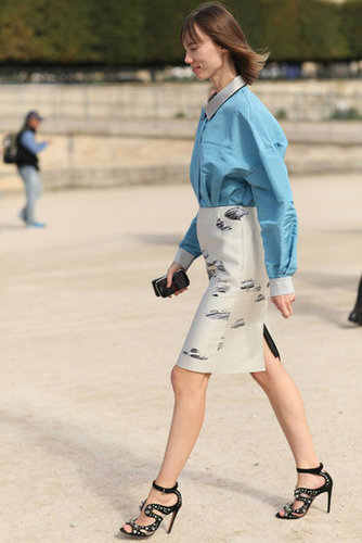 Whimsical footwear and a playful print livened up a minimalist button-down.
Whimsical footwear and a playful print livened up a minimalist button-down.
