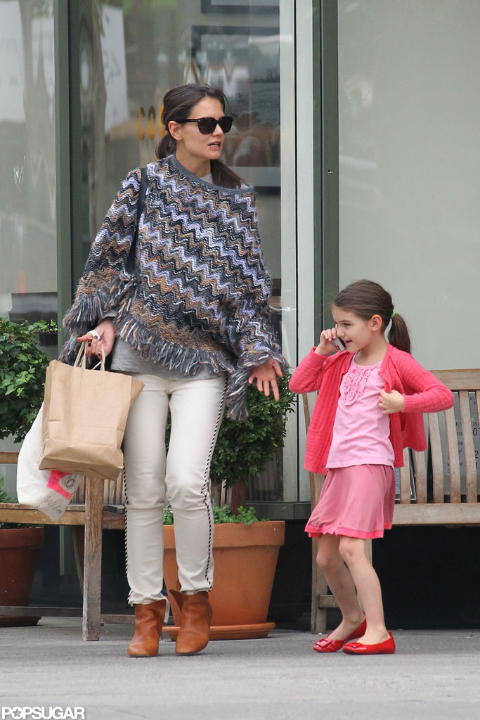 Suri Cruise smiled while she chatted on the phone with Katie Holmes by her side.
Suri Cruise smiled while she chatted on the phone with Katie Holmes by her side.