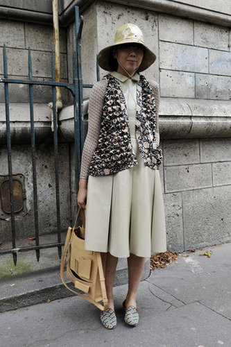 Susie Bubble kept it ladylike in a collared midi dress and slippers.
Susie Bubble kept it ladylike in a collared midi dress and slippers.