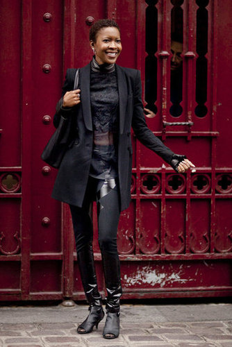Her long tuxedo-inspired blazer puts a refined spin on her tougher layers.
Her long tuxedo-inspired blazer puts a refined spin on her tougher layers.