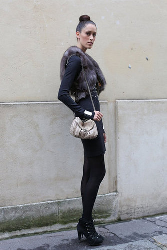 This fur gilet upped the Fall feel with a decidedly decadent twist on her LBD and lace-ups.
This fur gilet upped the Fall feel with a decidedly decadent twist on her LBD and lace-ups.