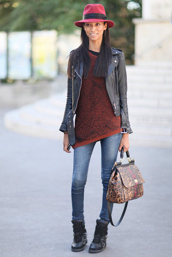 Fall-feeling cool, thanks to a leather jacket, cranberry fedora, and studded sneakers.
Fall-feeling cool, thanks to a leather jacket, cranberry fedora, and studded sneakers.