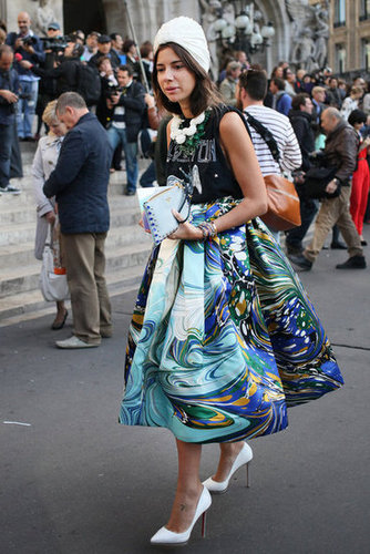 A mix of trends and personal, whimsical style, via statement jewels, a t-shirt, that full skirt, and chic turban.
A mix of trends and personal, whimsical style, via statement jewels, a t-shirt, that full skirt, and chic turban.