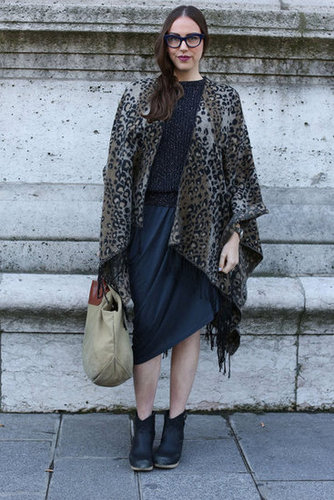 A leopard cape took a navy palette to a more exotic place.
A leopard cape took a navy palette to a more exotic place.