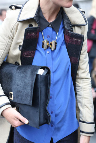 A bookish bag furthered the old-school charm of her trench.
A bookish bag furthered the old-school charm of her trench.