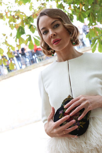 An embroidered clutch lent a pretty finish to high-fashion feathers.
An embroidered clutch lent a pretty finish to high-fashion feathers.