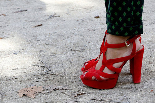 Red heels spiced up printed pants.
Red heels spiced up printed pants.