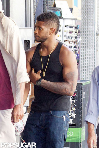 Usher bared his biceps in a tight black tank while heading to the set of his music video in August 2012.
Usher bared his biceps in a tight black tank while heading to the set of his music video in August 2012.