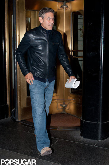 George Clooney left his hotel in Manhattan carrying a script.
George Clooney left his hotel in Manhattan carrying a script.