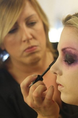 To create a sense of depth and texture, lean back and tap Dark Soul pigment over your eyelids and below. "If you don't have loose pigment, you can shave an eye shadow and dip your brush in," Zizzo says. Follow with a generous coat of mascara; Zizzo used MAC's new In Extra Dimension mascara, out in December.
To create a sense of depth and texture, lean back and tap Dark Soul pigment over your eyelids and below. "If you don't have loose pigment, you can shave an eye shadow and dip your brush in," Zizzo says. Follow with a generous coat of mascara; Zizzo used MAC's new In Extra Dimension mascara, out in December.