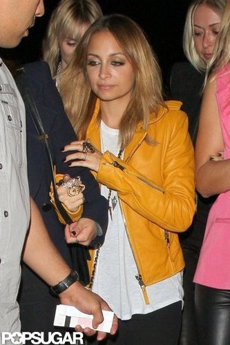 Nicole Richie wore a yellow leather jacket.
Nicole Richie wore a yellow leather jacket.