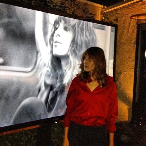 Alexa Chung posed with her campaign for Maje at a party this October.
Alexa Chung posed with her campaign for Maje at a party this October.