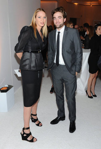 Robert Pattinson posed for photos with Uma Thurman at the Elle Women in Hollywood Awards in LA.
Robert Pattinson posed for photos with Uma Thurman at the Elle Women in Hollywood Awards in LA.