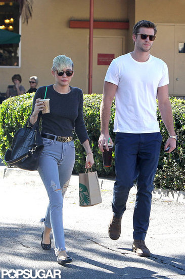 Miley Cyrus and Liam Hemsworth picked up coffees together. Miley Cyrus and Liam Hemsworth picked up coffees together.