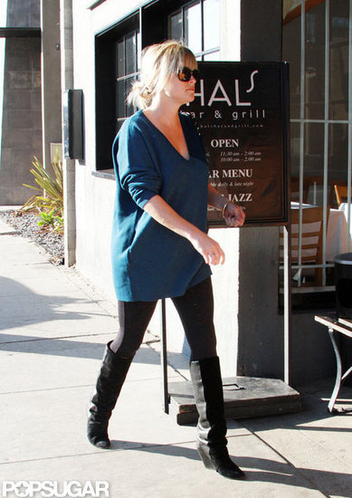 Resse Witherspoon stepped out in black boots and leggings in LA. Resse Witherspoon stepped out in black boots and leggings in LA.