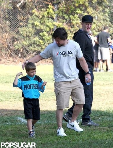 Mark Wahlberg and Michael Wahlberg walked over to the field.
Mark Wahlberg and Michael Wahlberg walked over to the field.