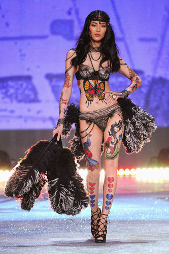 Liu Wen wore feathers on the runway at the Victoria's Secret Fashion Show in NYC.
Liu Wen wore feathers on the runway at the Victoria's Secret Fashion Show in NYC.