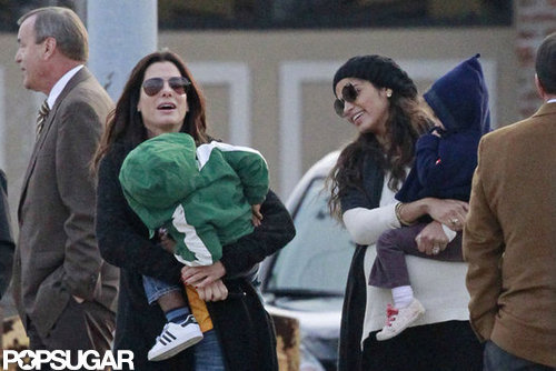 Sandra Bullock and Camila Alves had a laugh together as they held their children in New Orleans.
Sandra Bullock and Camila Alves had a laugh together as they held their children in New Orleans.