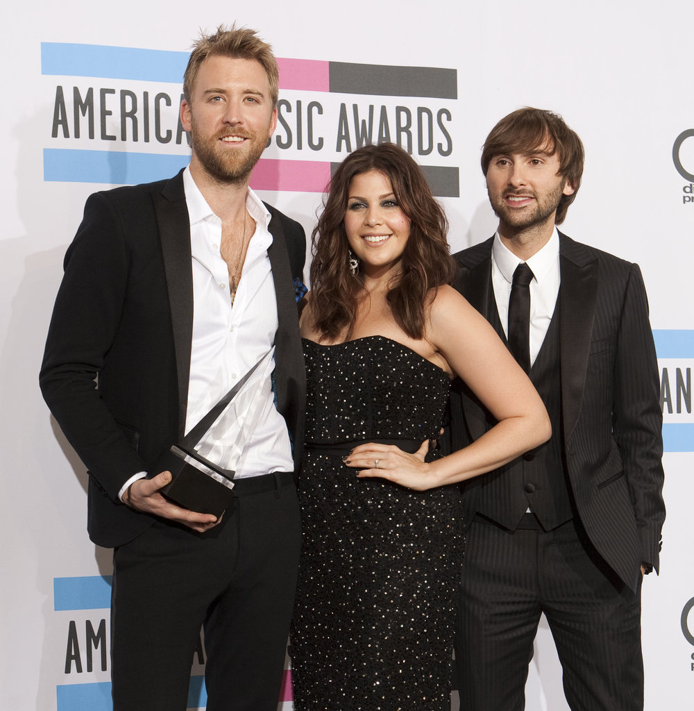 Lady Antebellum posed with their prize in 2011.
Lady Antebellum posed with their prize in 2011.