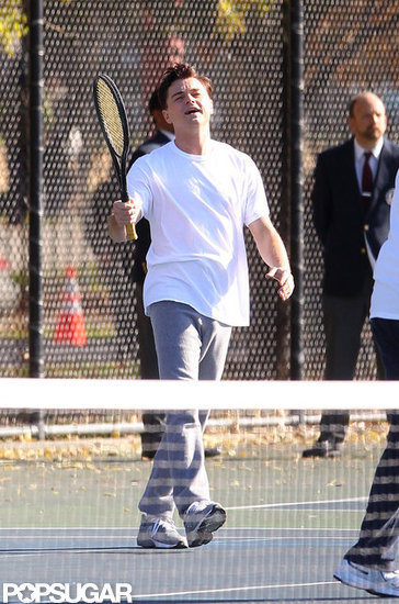 Leonardo DiCaprio took over the tennis court while filming.
Leonardo DiCaprio took over the tennis court while filming.