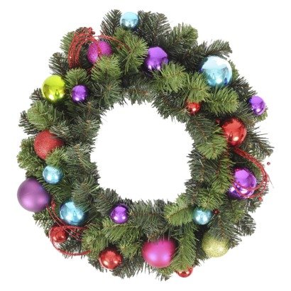 Hang this multi-colored Ornament Wreath ($25) inside or outside for a festive wintry touch.
Hang this multi-colored Ornament Wreath ($25) inside or outside for a festive wintry touch.