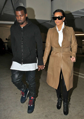 Kanye West and Kim Kardashian held hands in LA in December 2012.
Kanye West and Kim Kardashian held hands in LA in December 2012.