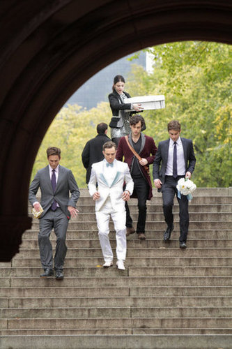 Here comes the groom, flanked by his closest male friends (and Georgina).
Here comes the groom, flanked by his closest male friends (and Georgina).