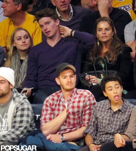 Maria Shriver sat behind Andrew Garfield.
Maria Shriver sat behind Andrew Garfield.