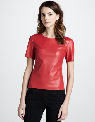 Show off this BCBGMAXAZRIA red faux leather top ($148) at all your upcoming holiday soirees. Pair it with black trousers, black patent pumps, and a shiny rhinestone necklace.
Show off this BCBGMAXAZRIA red faux leather top ($148) at all your upcoming holiday soirees. Pair it with black trousers, black patent pumps, and a shiny rhinestone necklace.