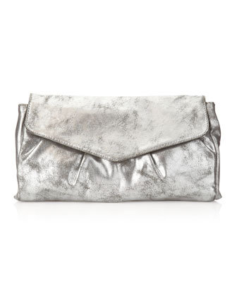 A cool metallic handbag like this R&J folded pleat clutch ($23, originally $58) looks way more luxe than its price tag suggests — and will go with any of your holiday outfits.
A cool metallic handbag like this R&J folded pleat clutch ($23, originally $58) looks way more luxe than its price tag suggests — and will go with any of your holiday outfits.