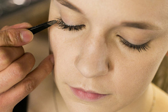 "Tweezers will help to really place the lash properly," Jennings says. "You get more precision with the tweezers as opposed to your fingers." Once you've placed the lashes, you can adjust them quickly while the glue is still a little tacky.
"Tweezers will help to really place the lash properly," Jennings says. "You get more precision with the tweezers as opposed to your fingers." Once you've placed the lashes, you can adjust them quickly while the glue is still a little tacky.