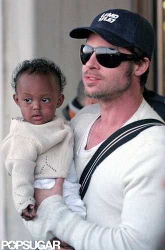 Brad Pitt held on to baby Zahara while the family visited Paris in March 2006.
Brad Pitt held on to baby Zahara while the family visited Paris in March 2006.