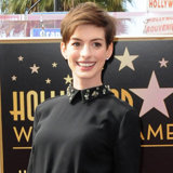 Anne Hathaway Wants Katie Holmes to Impersonate Her Anne Hathaway Wants Katie Holmes to Impersonate Her